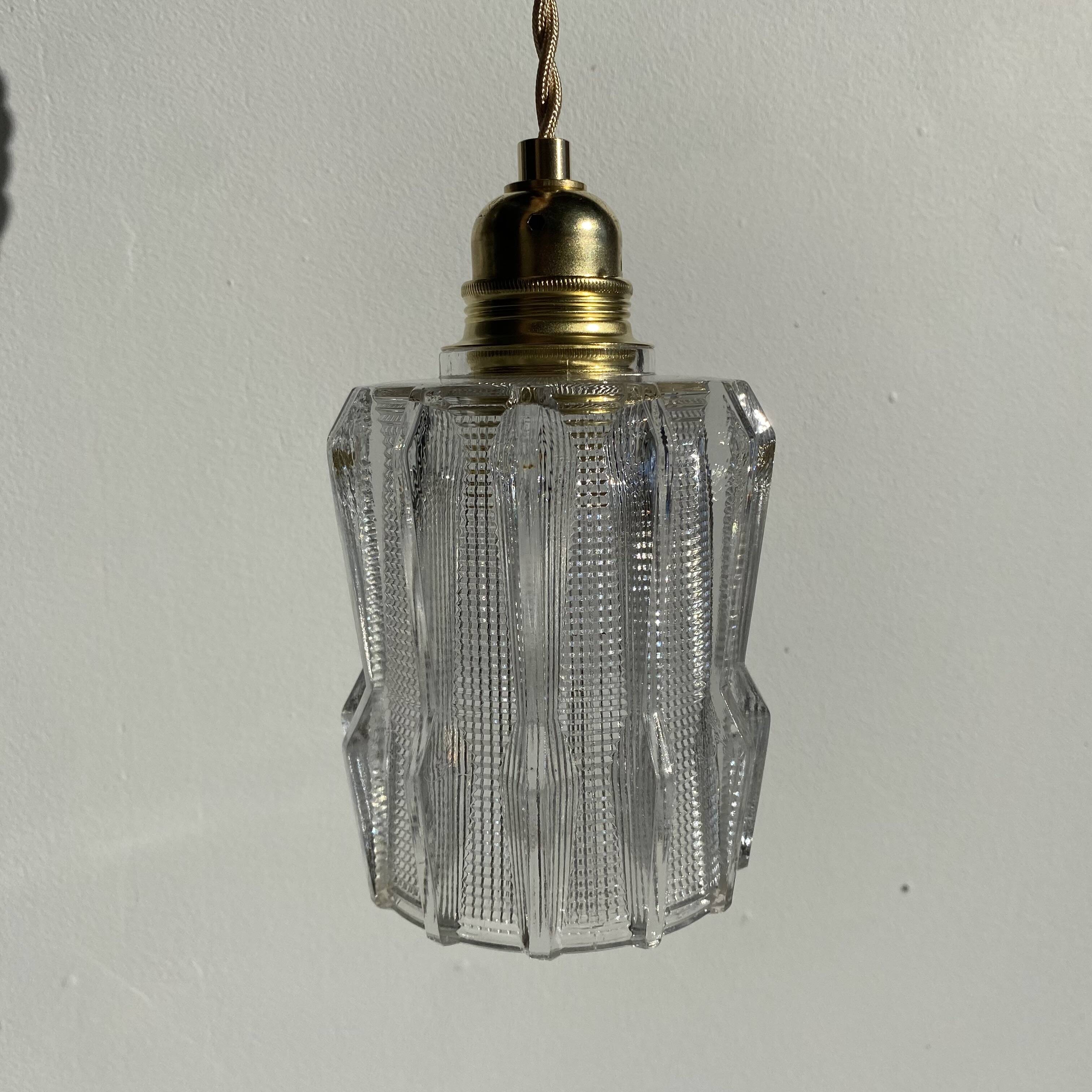 Pair of Art Deco pendant lights in molded pressed glass