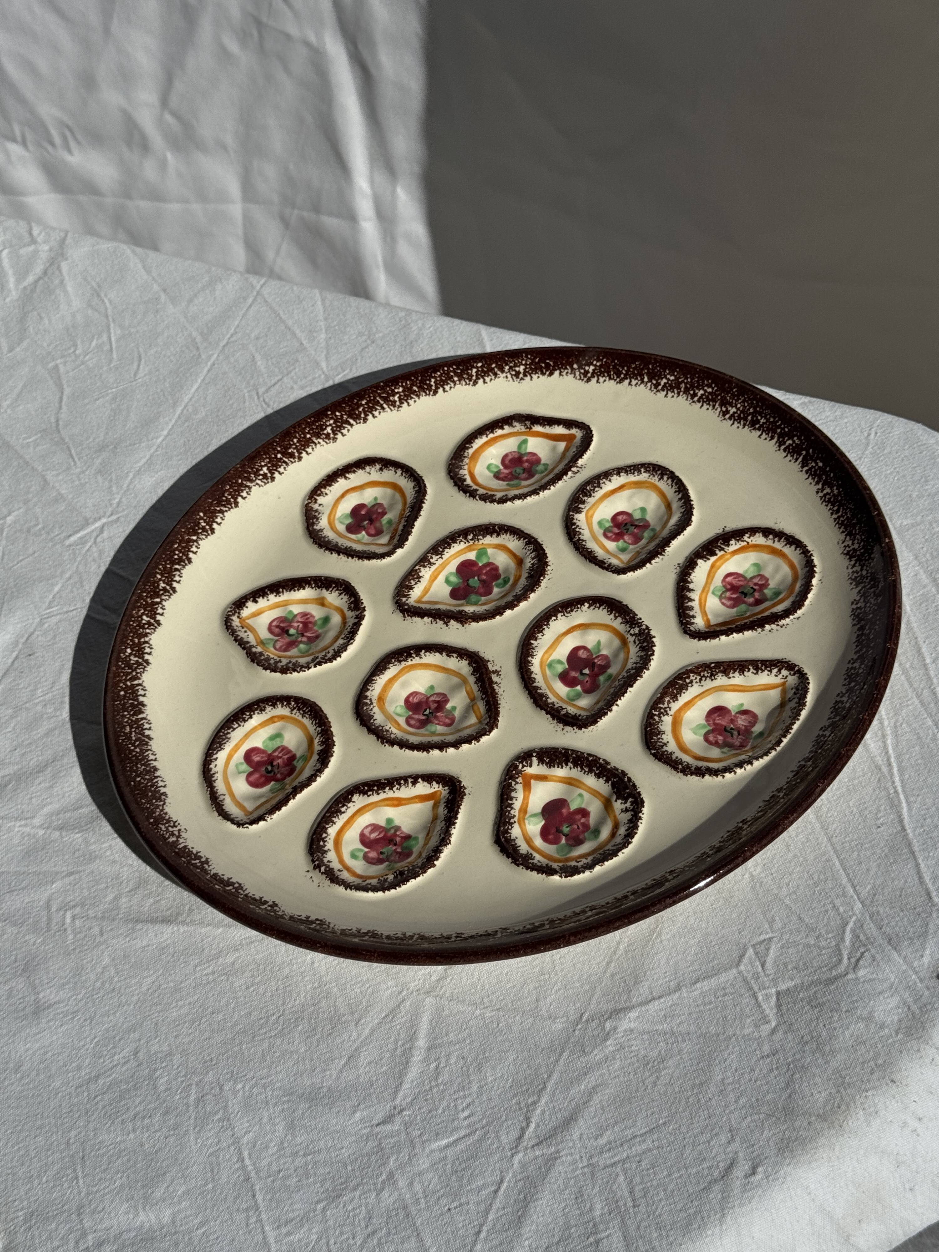 Large circular platter with compartments for shellfish, molluscs, and oysters.