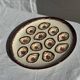 Large circular platter with compartments for shellfish, molluscs, and oysters.