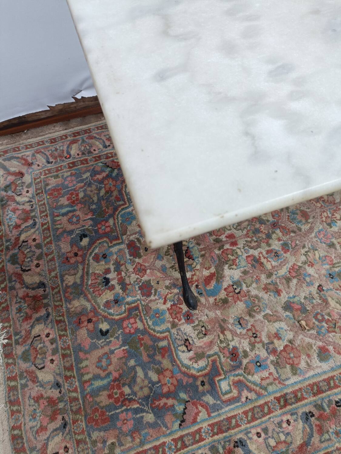 Bistro table with cast iron legs and marble top