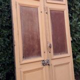 Porte d'entrée cintrée double en chêne, grilles et verre, XIXème