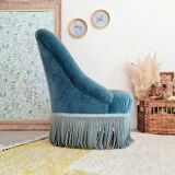 Fauteuil crapaud velours bleu avec franges