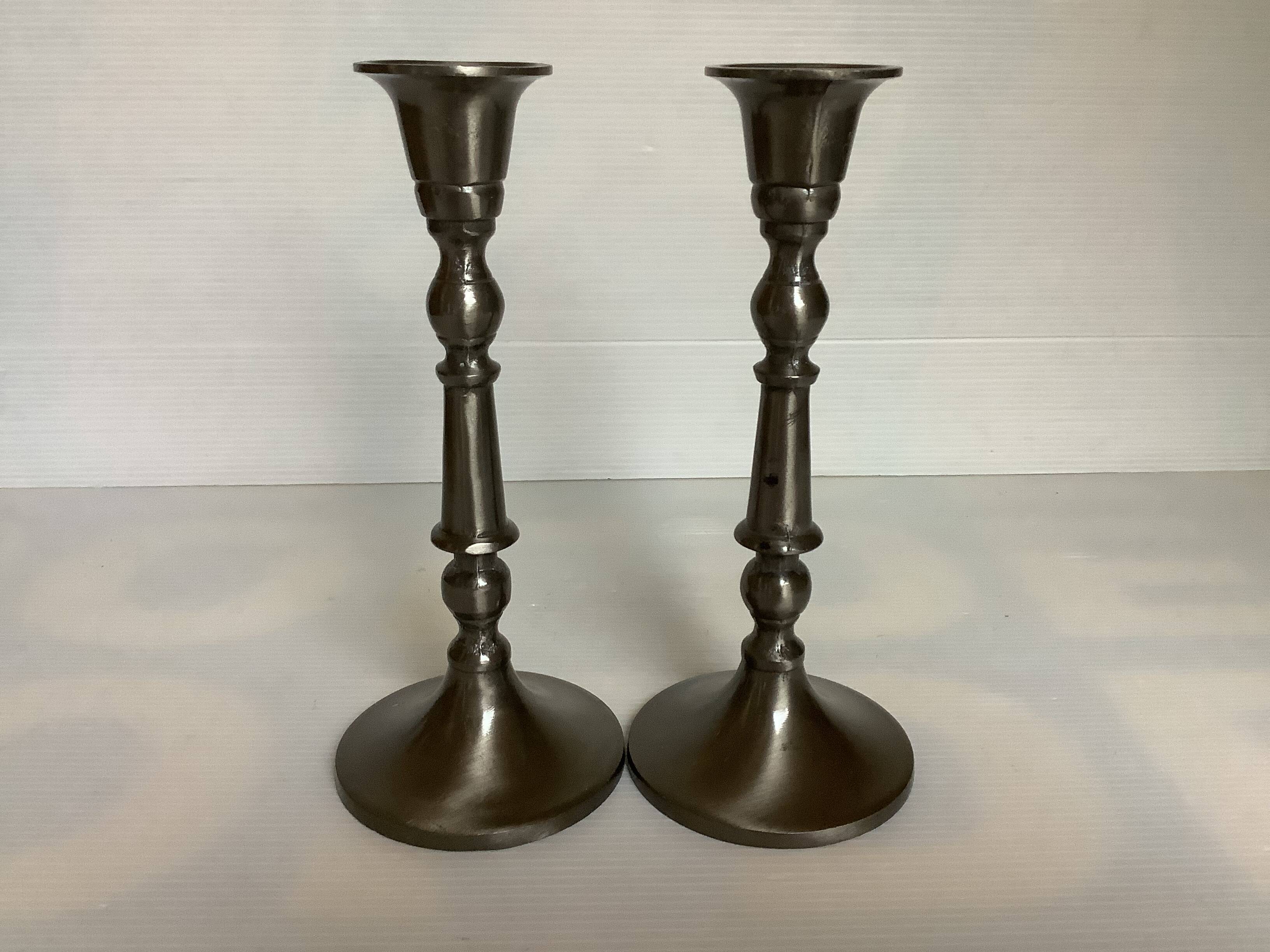 Pair of metal candlesticks