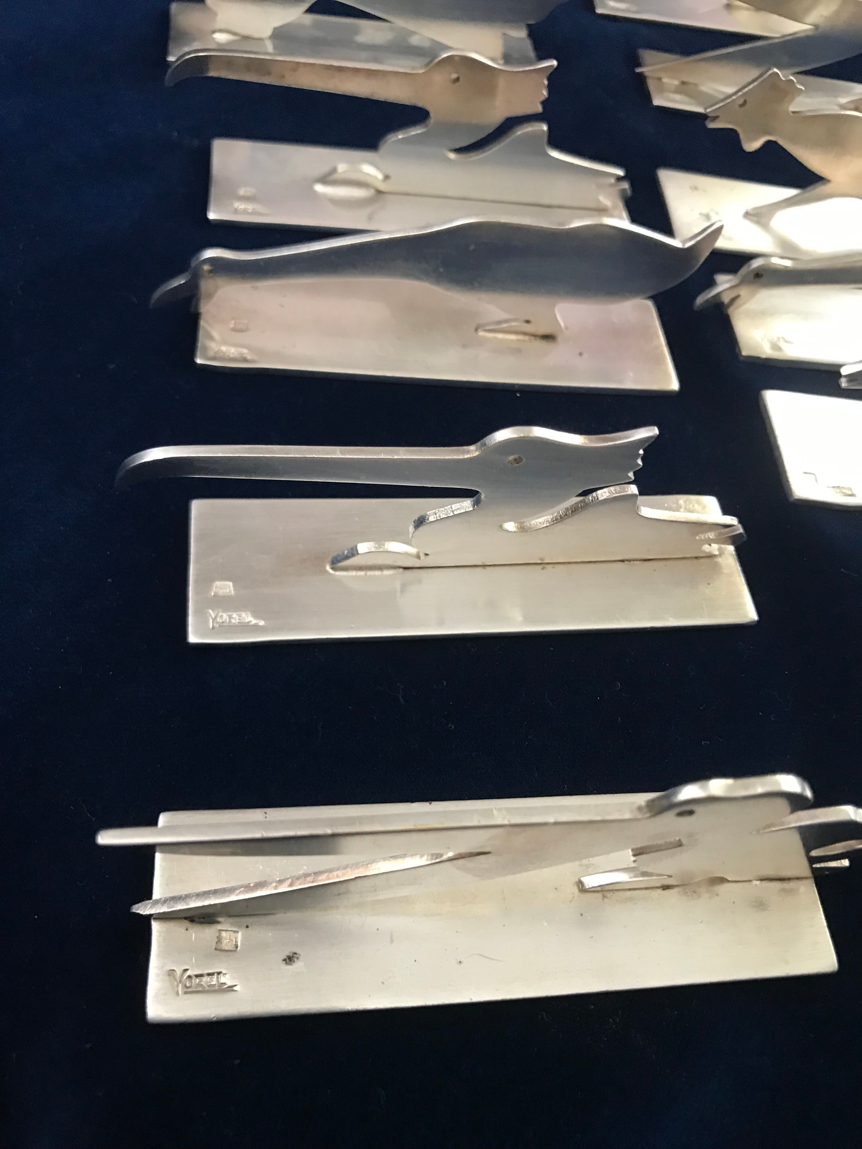 12 knife holders signed Yorel Art Deco