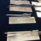 12 knife holders signed Yorel Art Deco