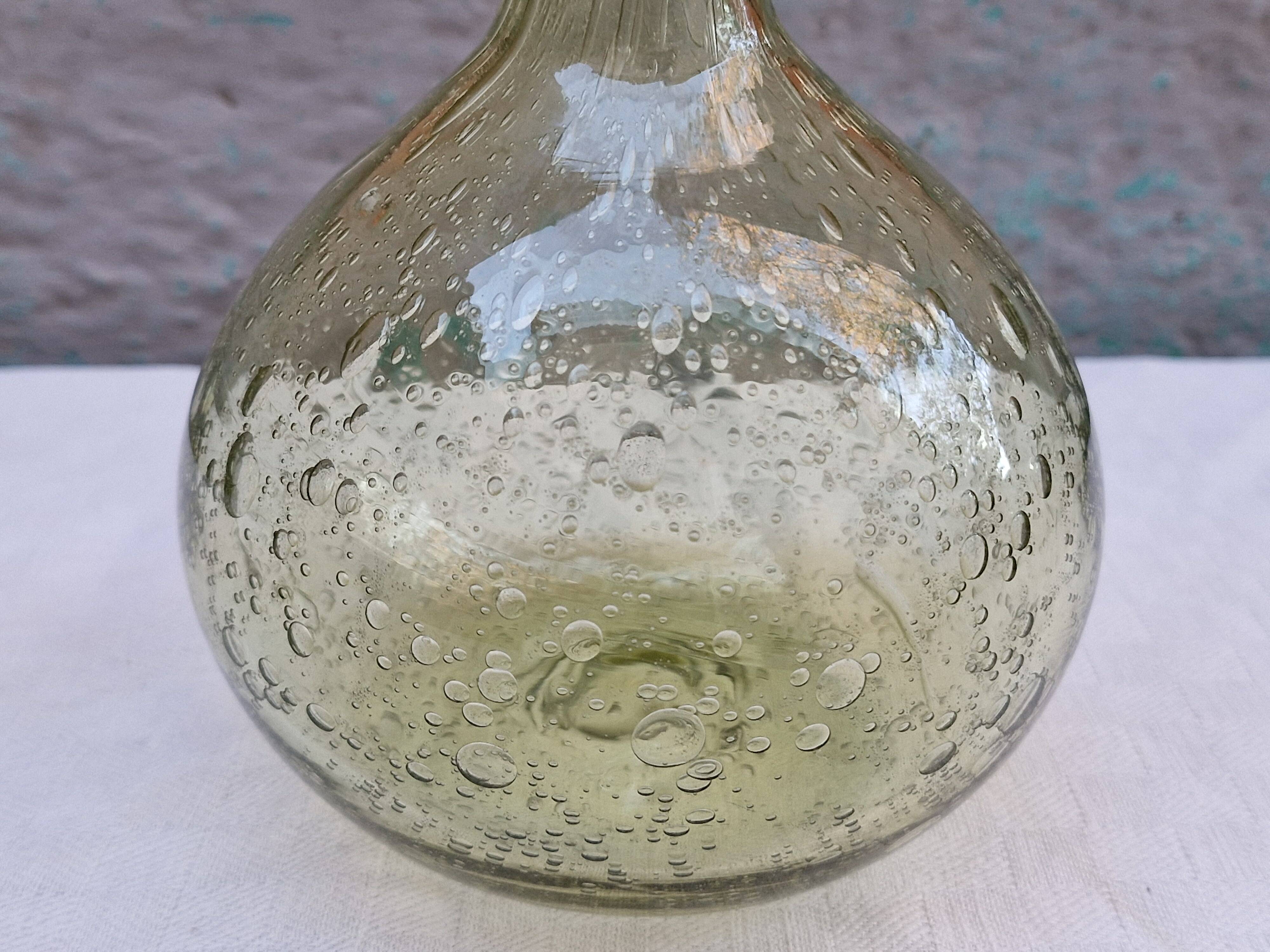 Vintage carafe signed Biot, blown glass, bubbled.