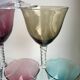 Set 6 colored wine glasses and worked feet 70s