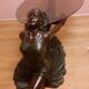 Coffee table, young woman in resin, smoked and beveled glass