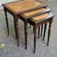 3 nesting tables in solid wood and tawny leather from the 1950s.