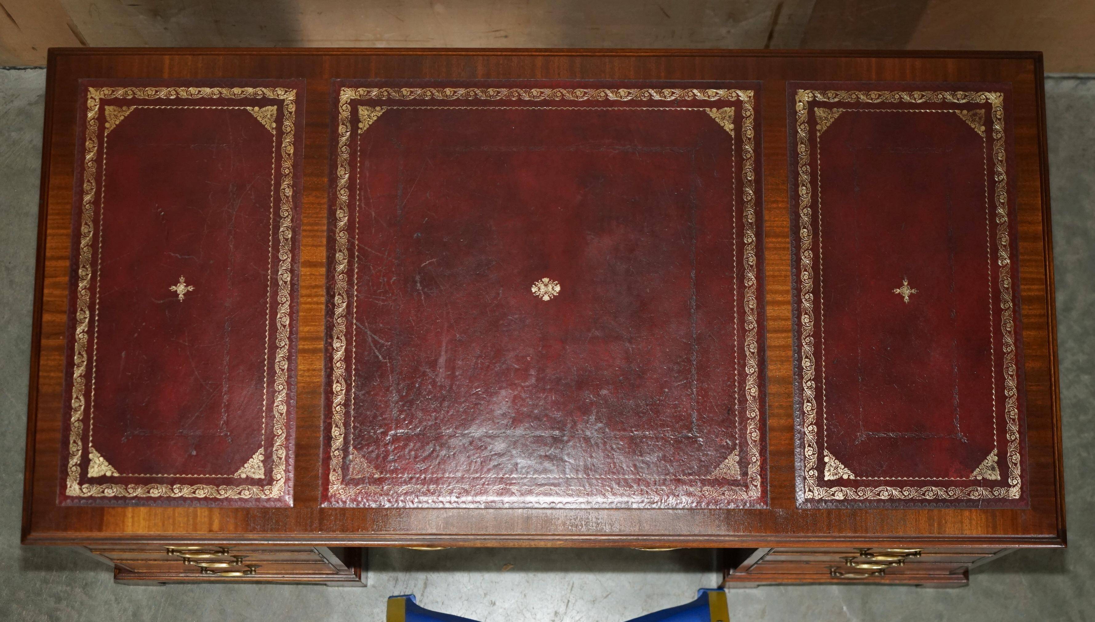 Partner desk Bevan Funnell in hardwood with leather top and gold leaf gilding.