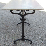 Bistro table, 1900, cast iron foot and marble top.