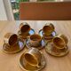 6 stoneware cups and 6 enamel plates