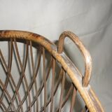 Cradle of doll in rattan on wheels