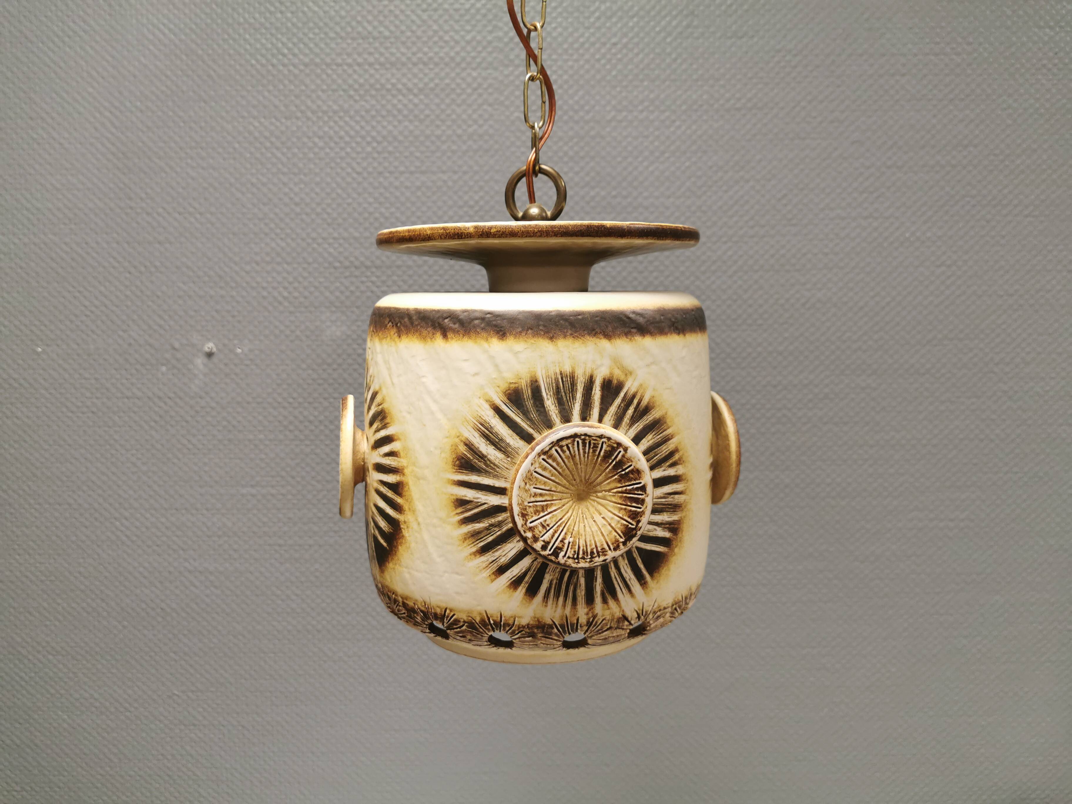 Large and beautiful hanging lamp in ceramic. Danish from the 70s, in super nice condition.