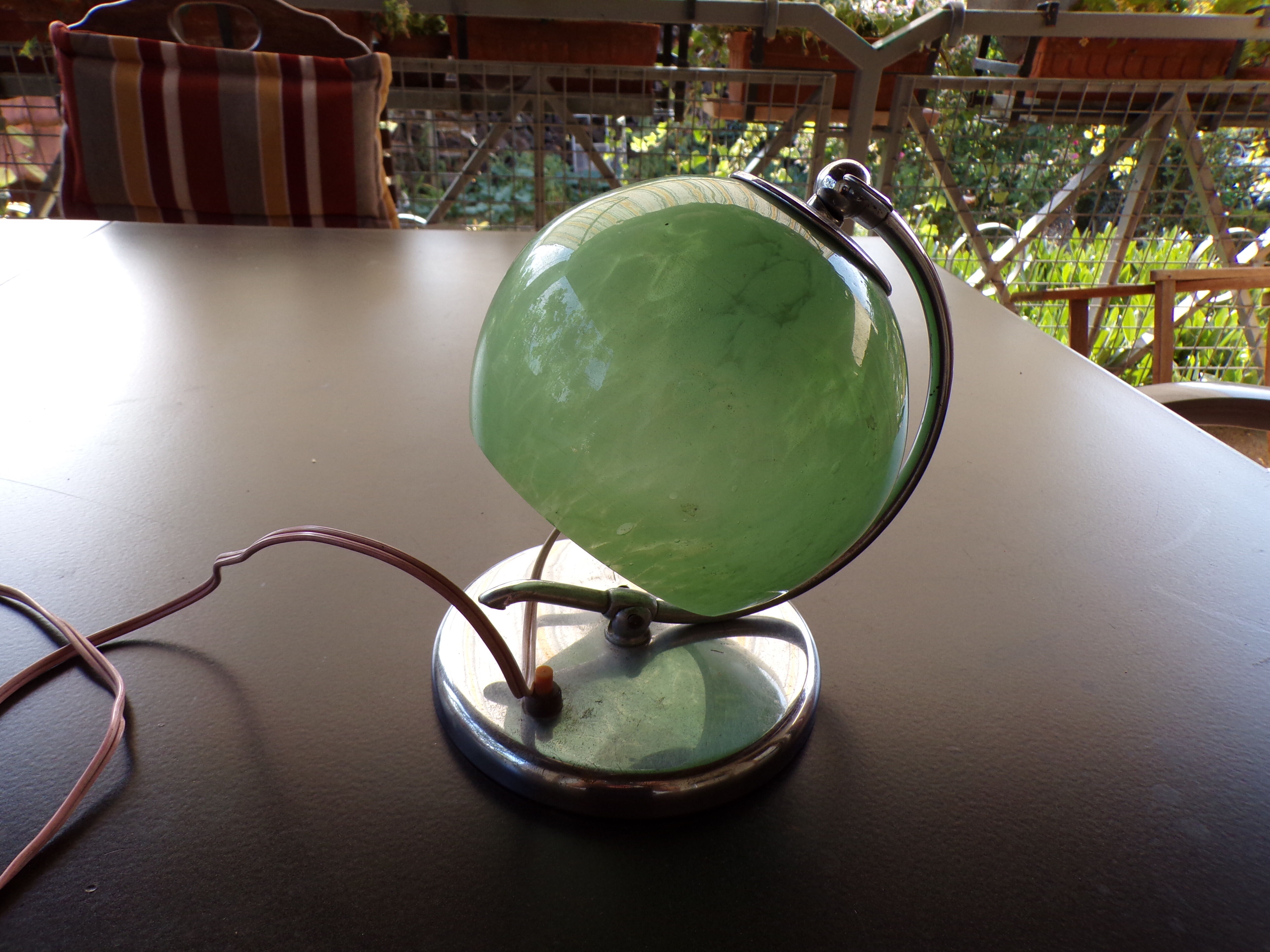Art deco bedside lamp, chrome metal and speckled green glass globe