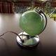 Art deco bedside lamp, chrome metal and speckled green glass globe