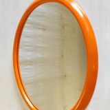 Orange oval mirror - 1970s