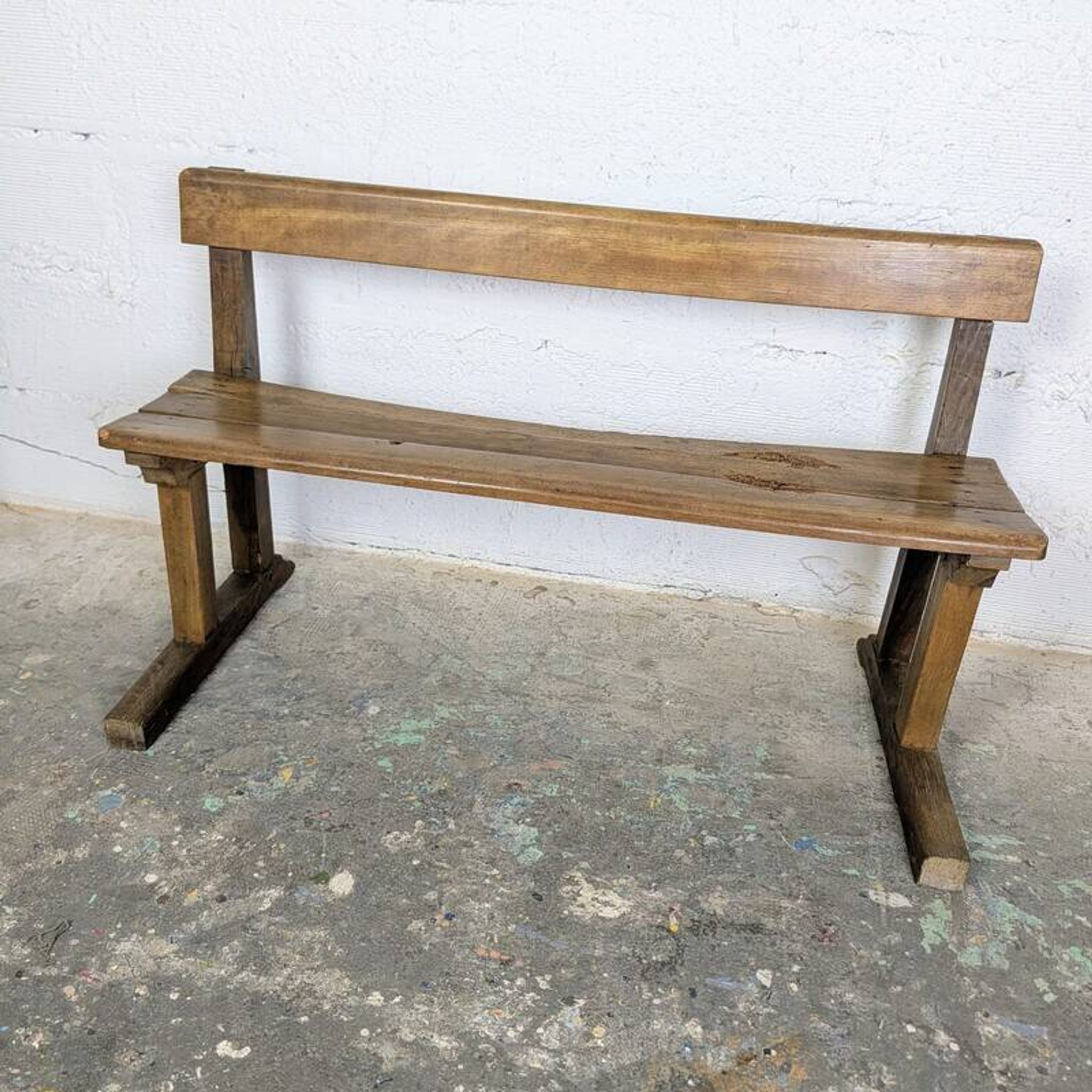 Double school desk and its wooden bench