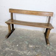 Double school desk and its wooden bench