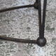 Black metal footing wooden coffee table