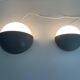 Round black metal wall lights, small and large set, by Bega, 1970s, Germany.