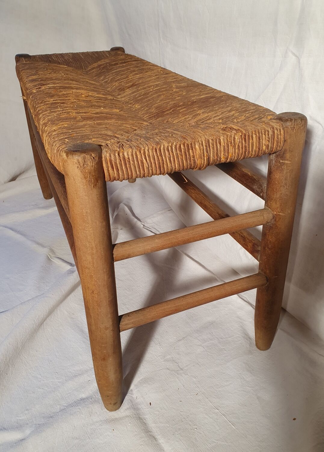 Wood and straw bench