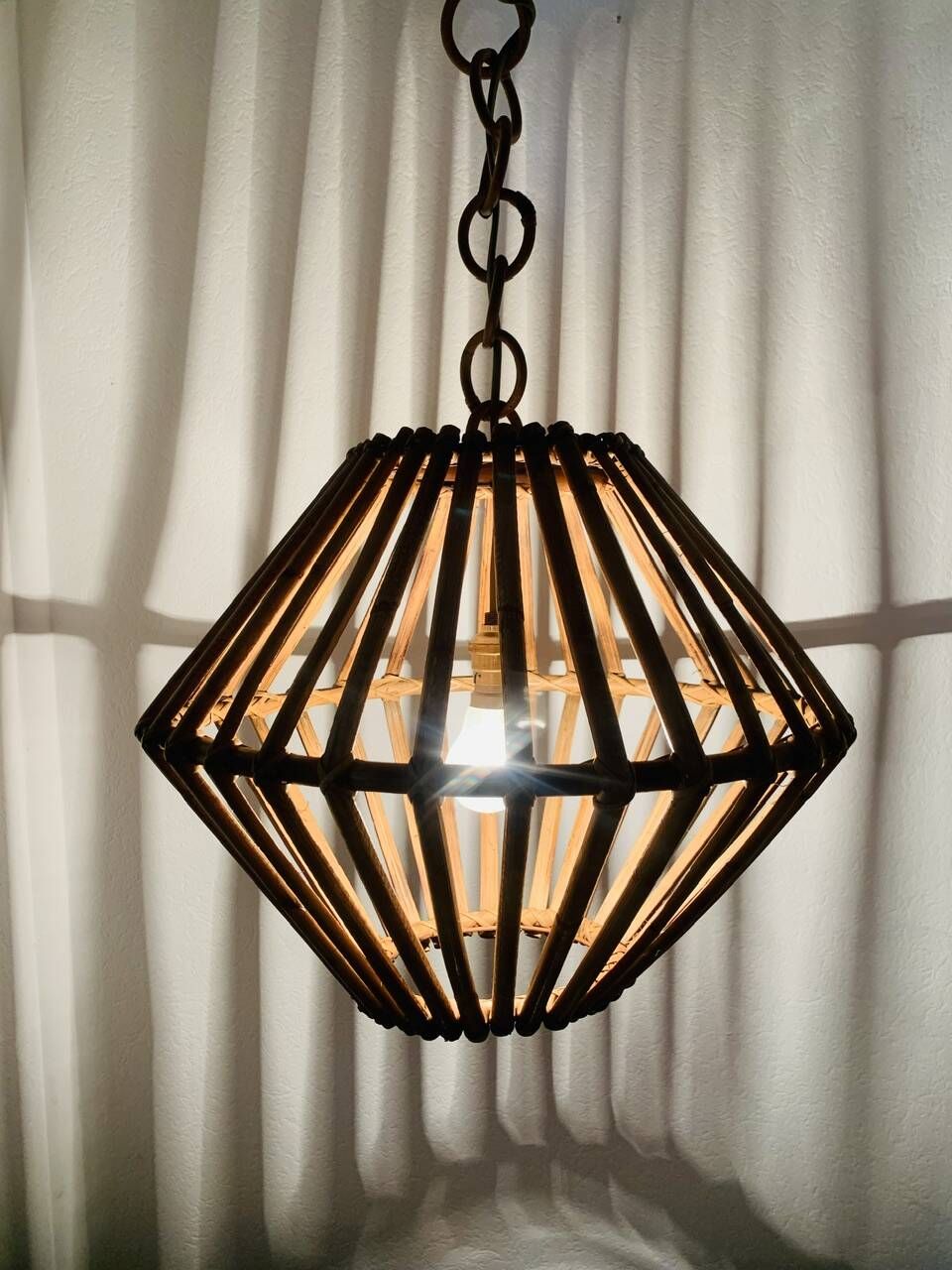 Large vintage pendant light in bamboo and rattan, circa 1960's