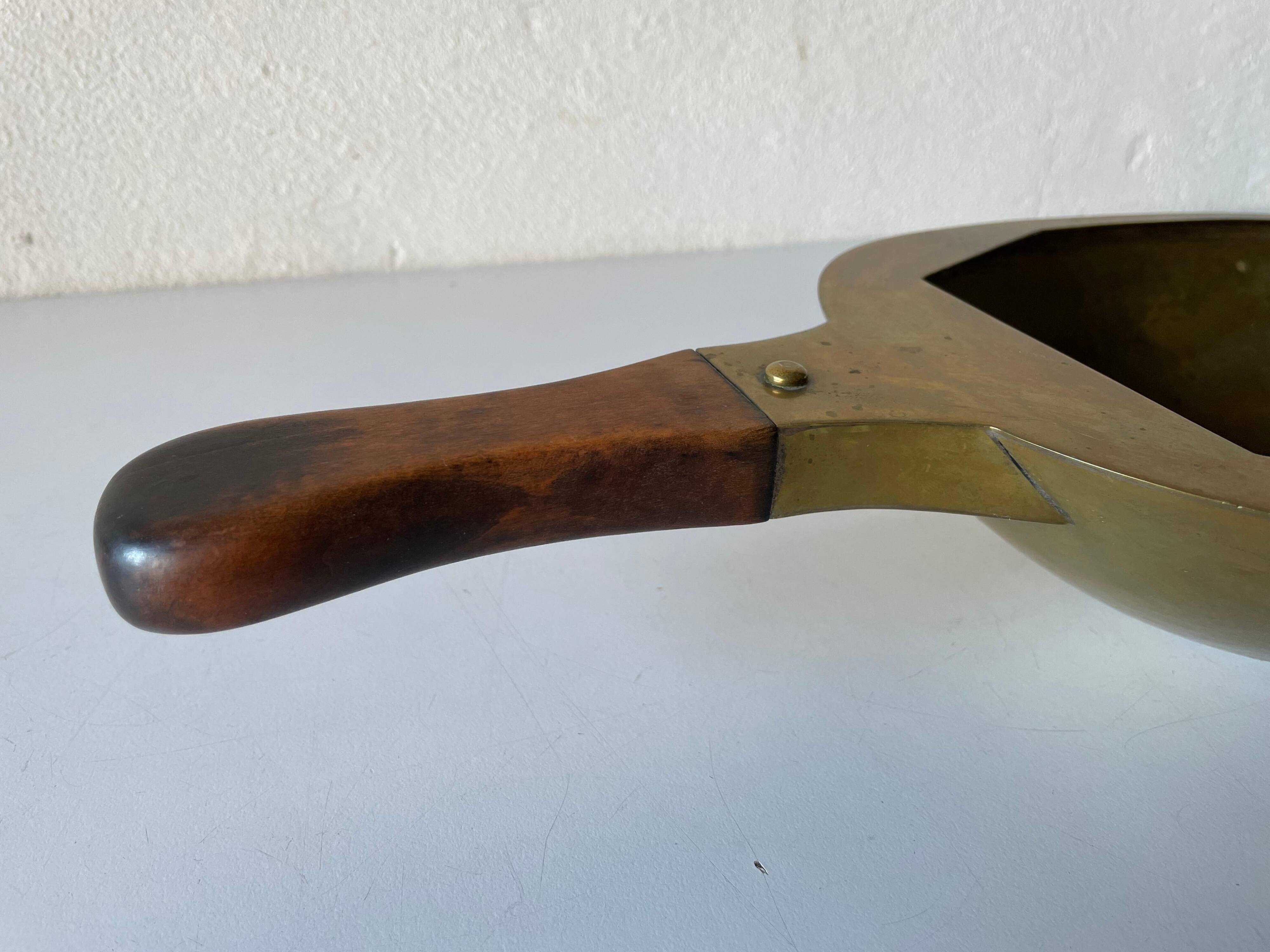Decorative brass bowl with wooden handle, 1970s, Turin, Italy.