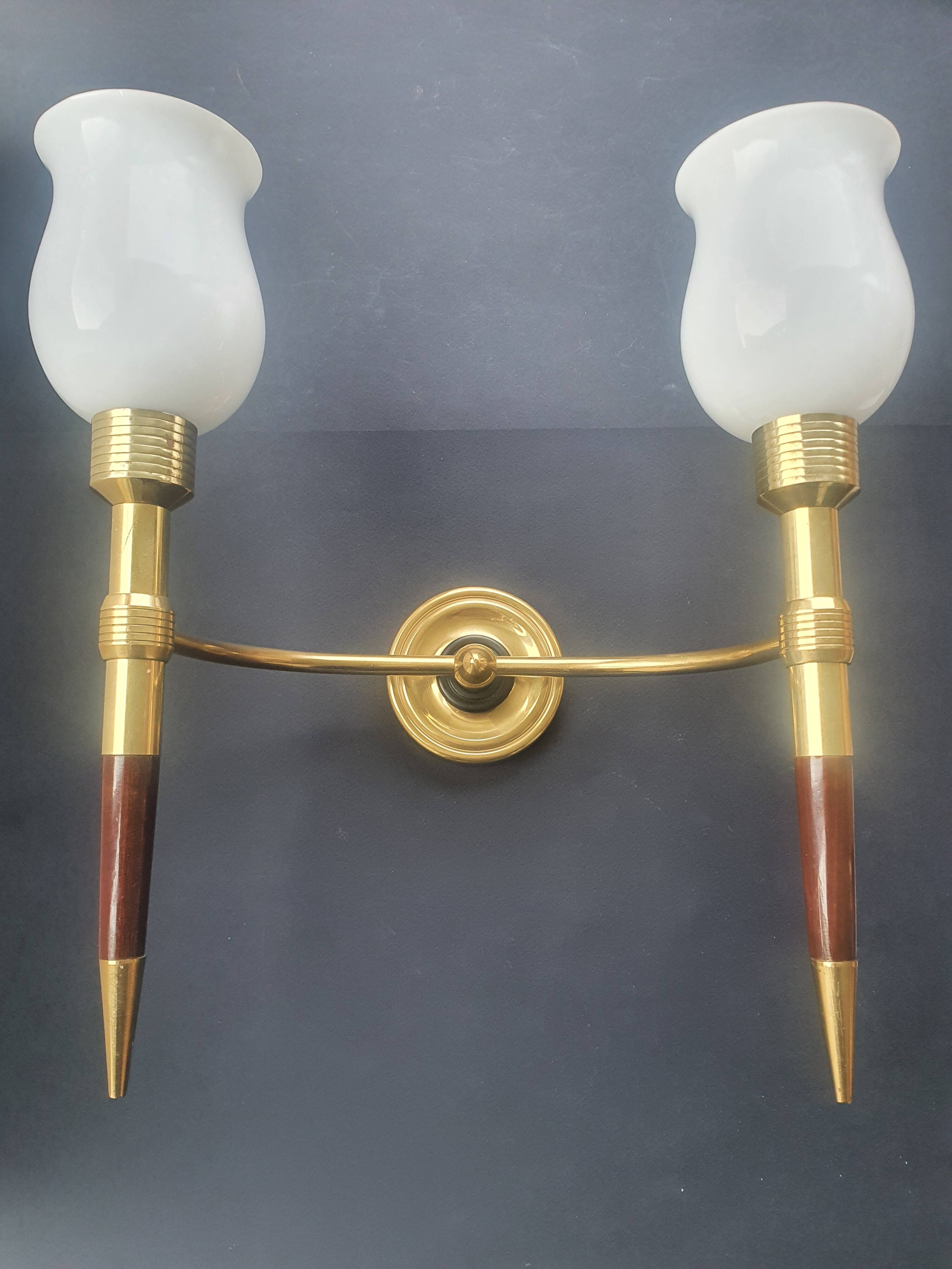 Large wall sconces torch style from the 1950s.