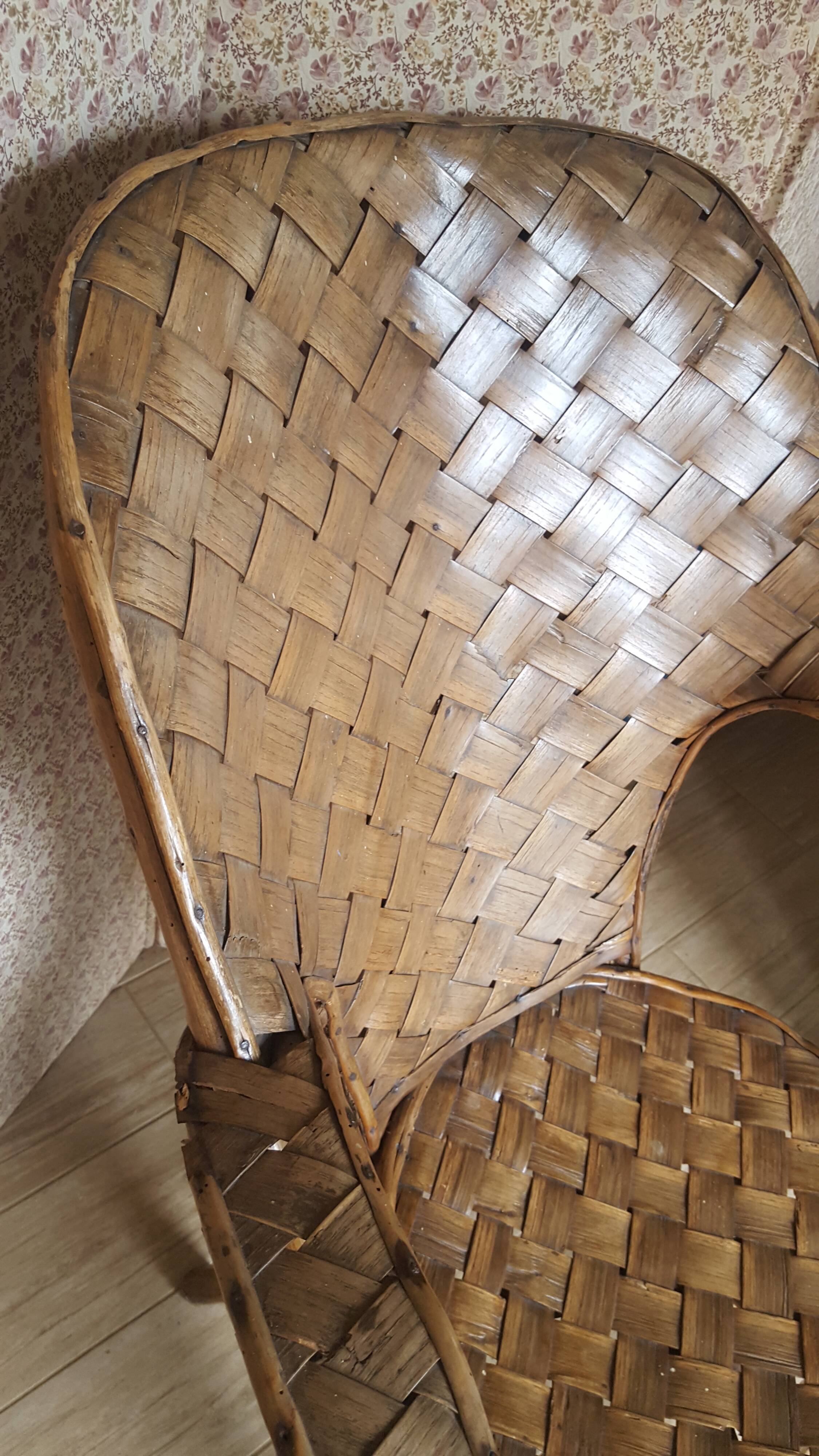 Old chair in braided chestnut