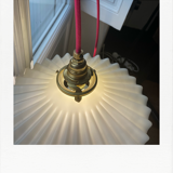 Pleated opaline suspension