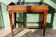 Work table, early 20th century, made of wood and riveted zinc.