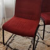 Red suede chairs, Knoll.