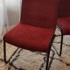 Red suede chairs, Knoll.