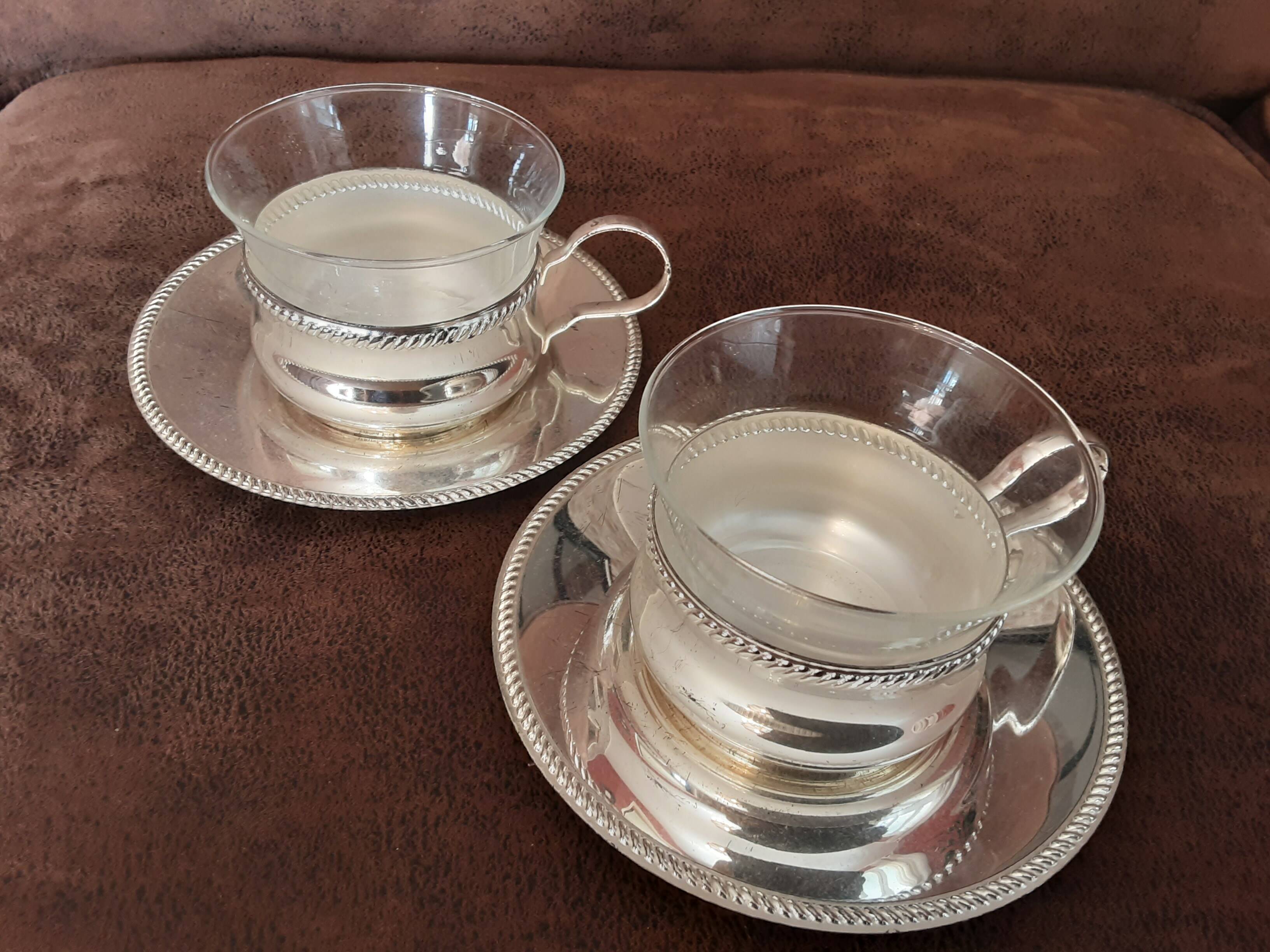 Set of 2 metal cups and saucers