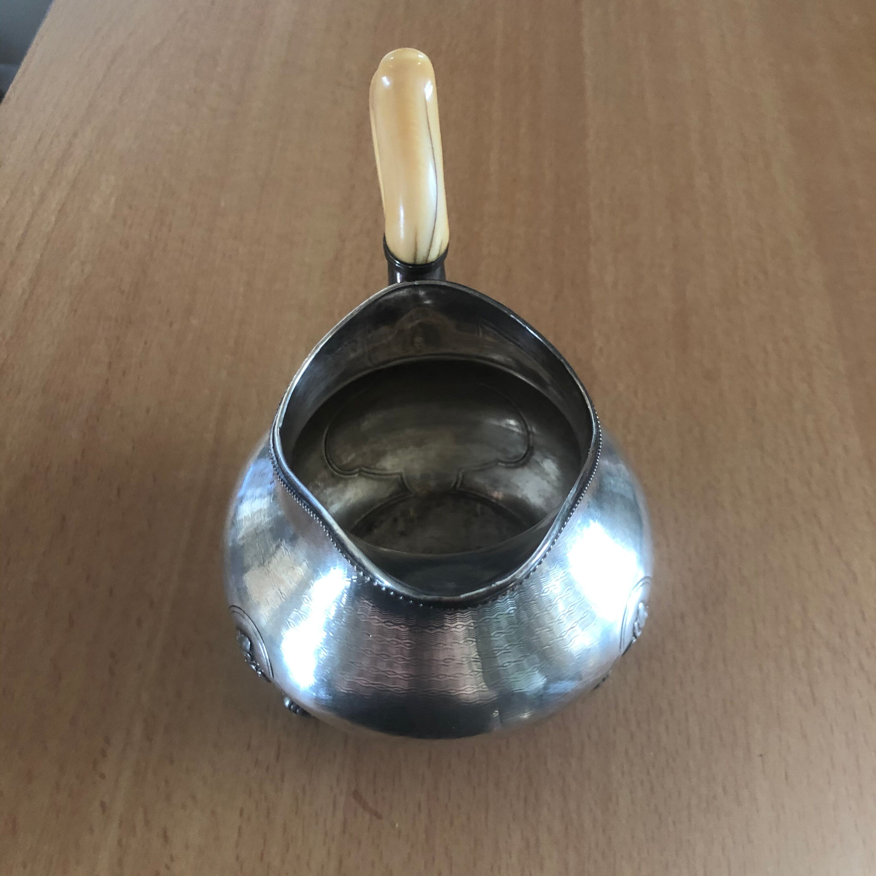 Silver metal milk pot