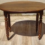 Antique walnut table with drop-leaf doors