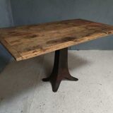 Old table on cast iron machine leg