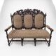Three-seater armchair in Louis XIII style made of oak from the 19th century.