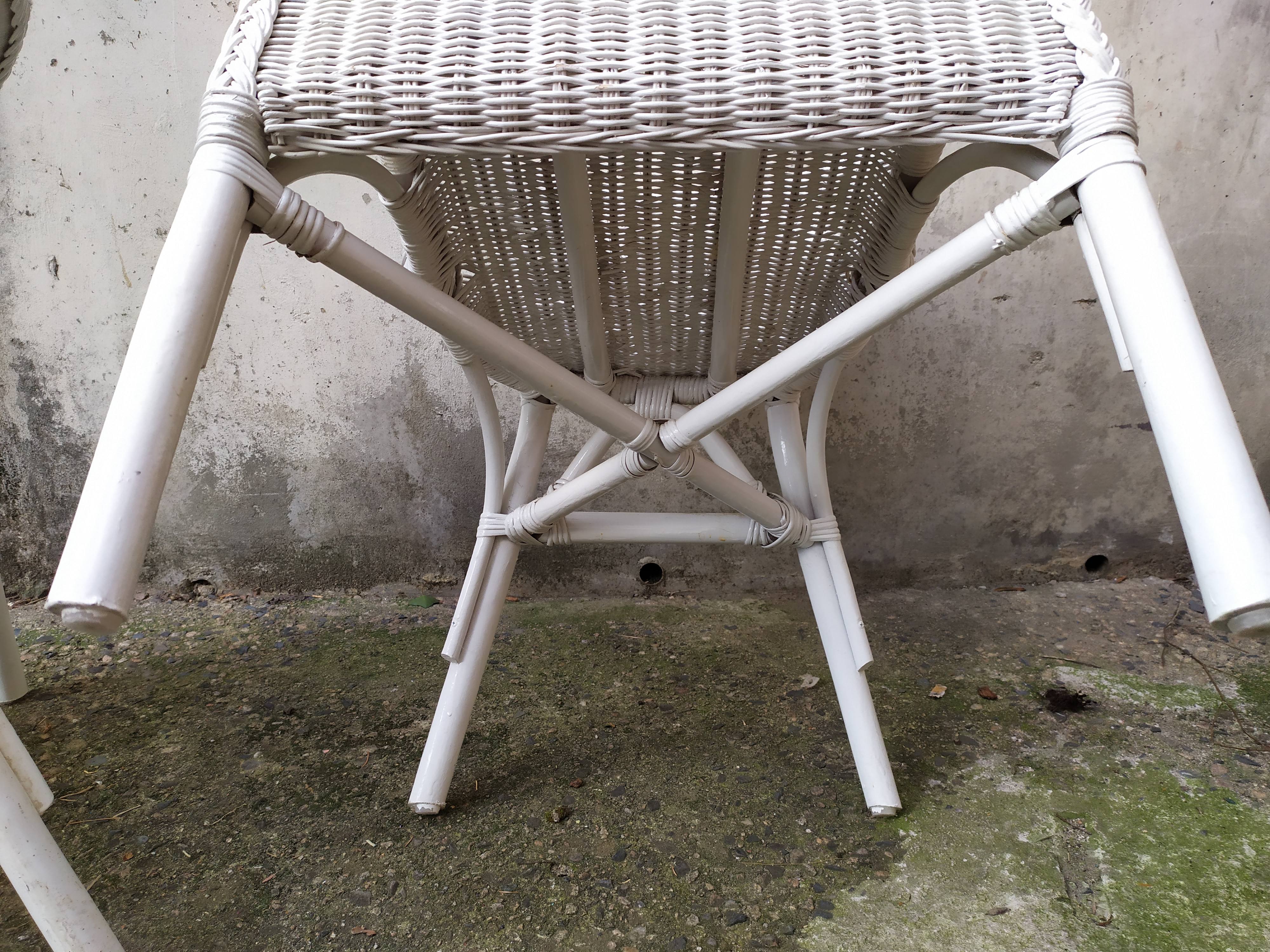 Pair of vintage rattan chairs