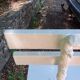 Old garden bench with cast iron feet and wooden planks