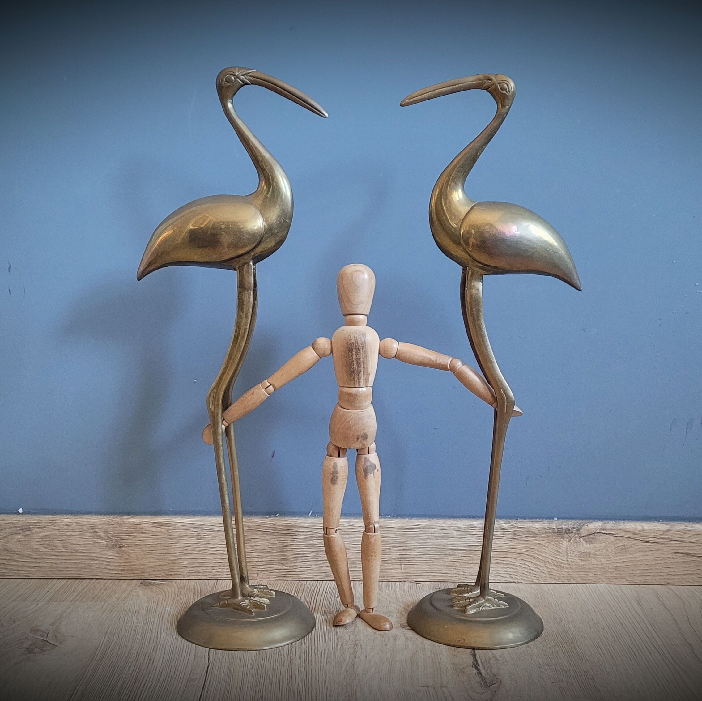 Duo brass herons