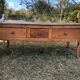 Antique Louis XV paneled table with 3 front drawers in solid cherry wood