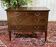 English commode in mahogany and oak from the early 20th century.