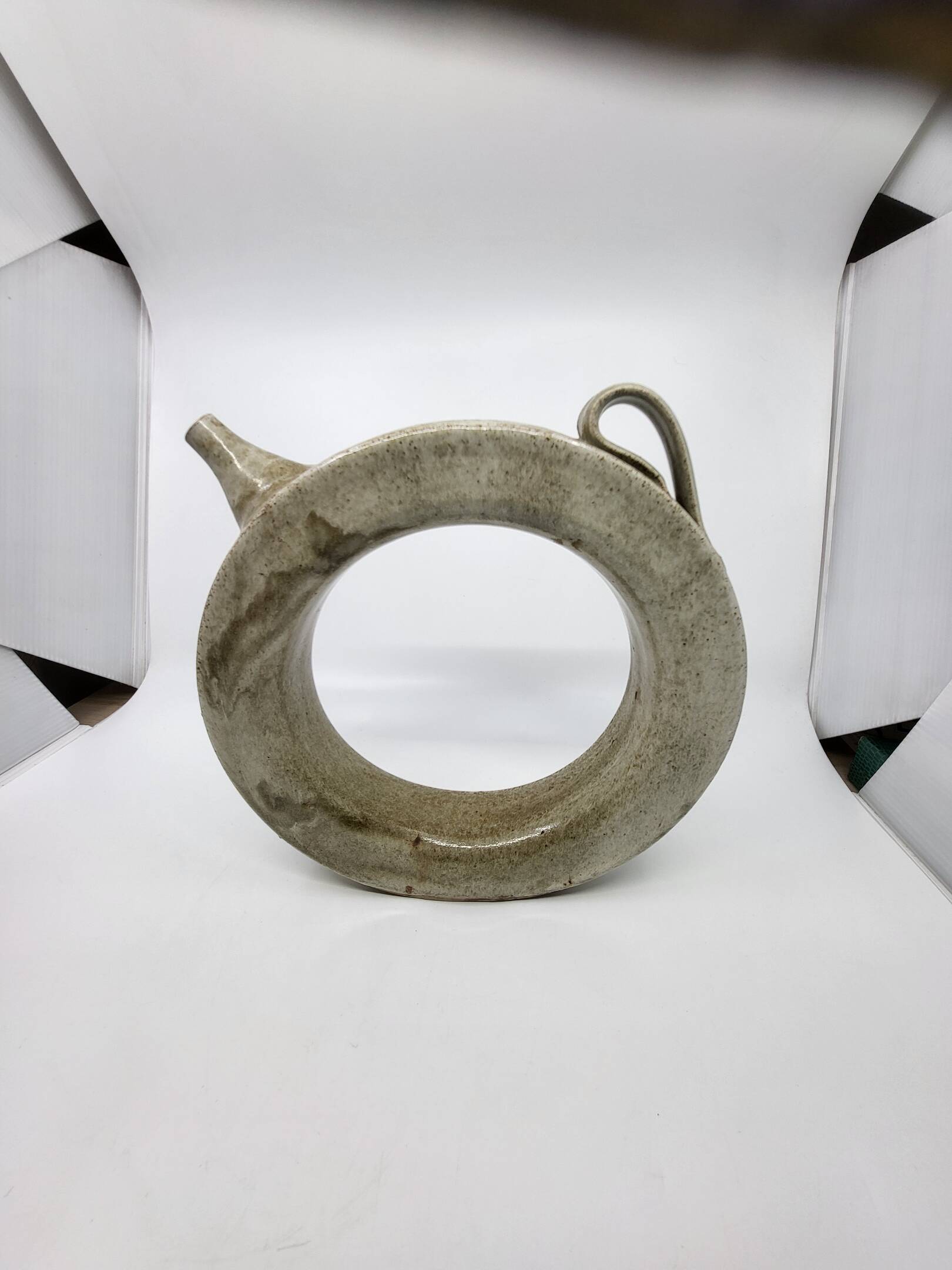 Vintage glazed stoneware pitcher in sculptural ring shape (1970s)