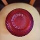 Red glass vitae bottle