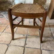 Campaign stool in rattan and wood