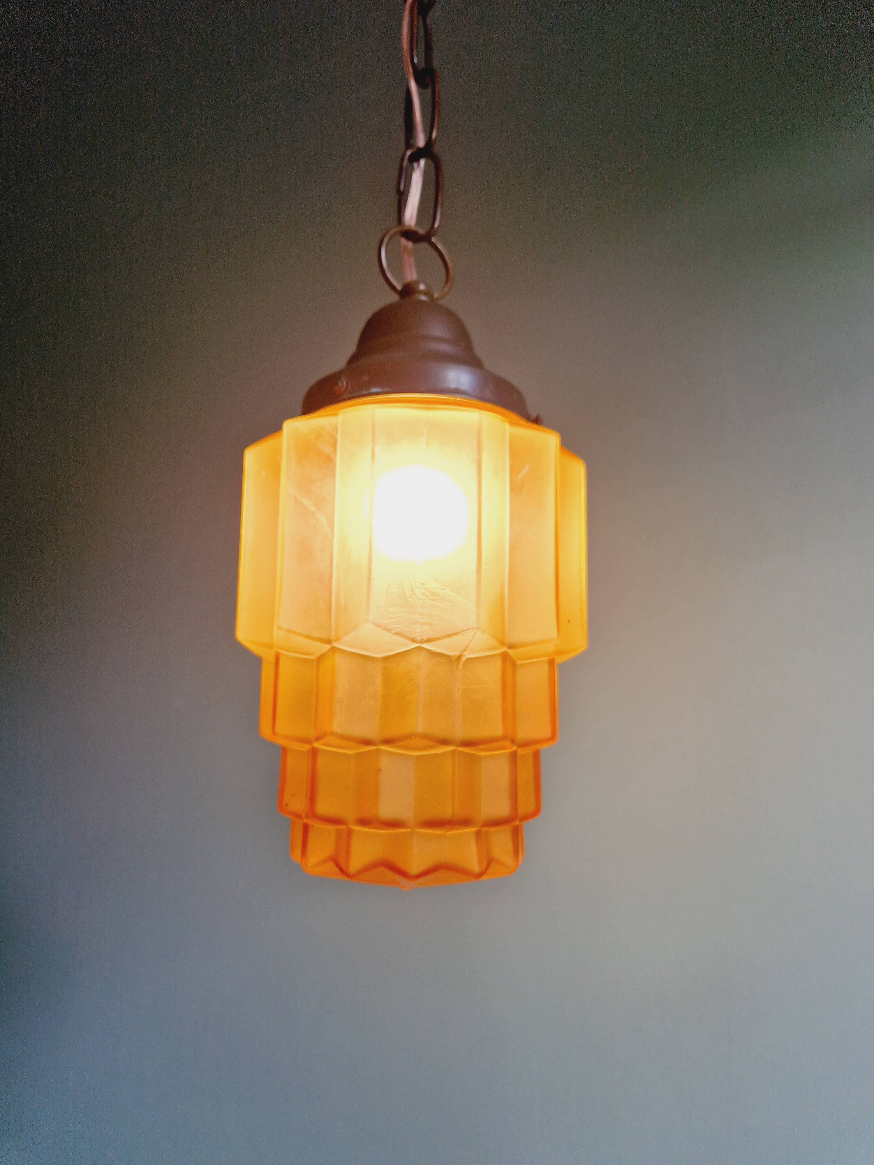 Art Deco Skyscraper type pendant lamp in amber glass, 1920s-30s