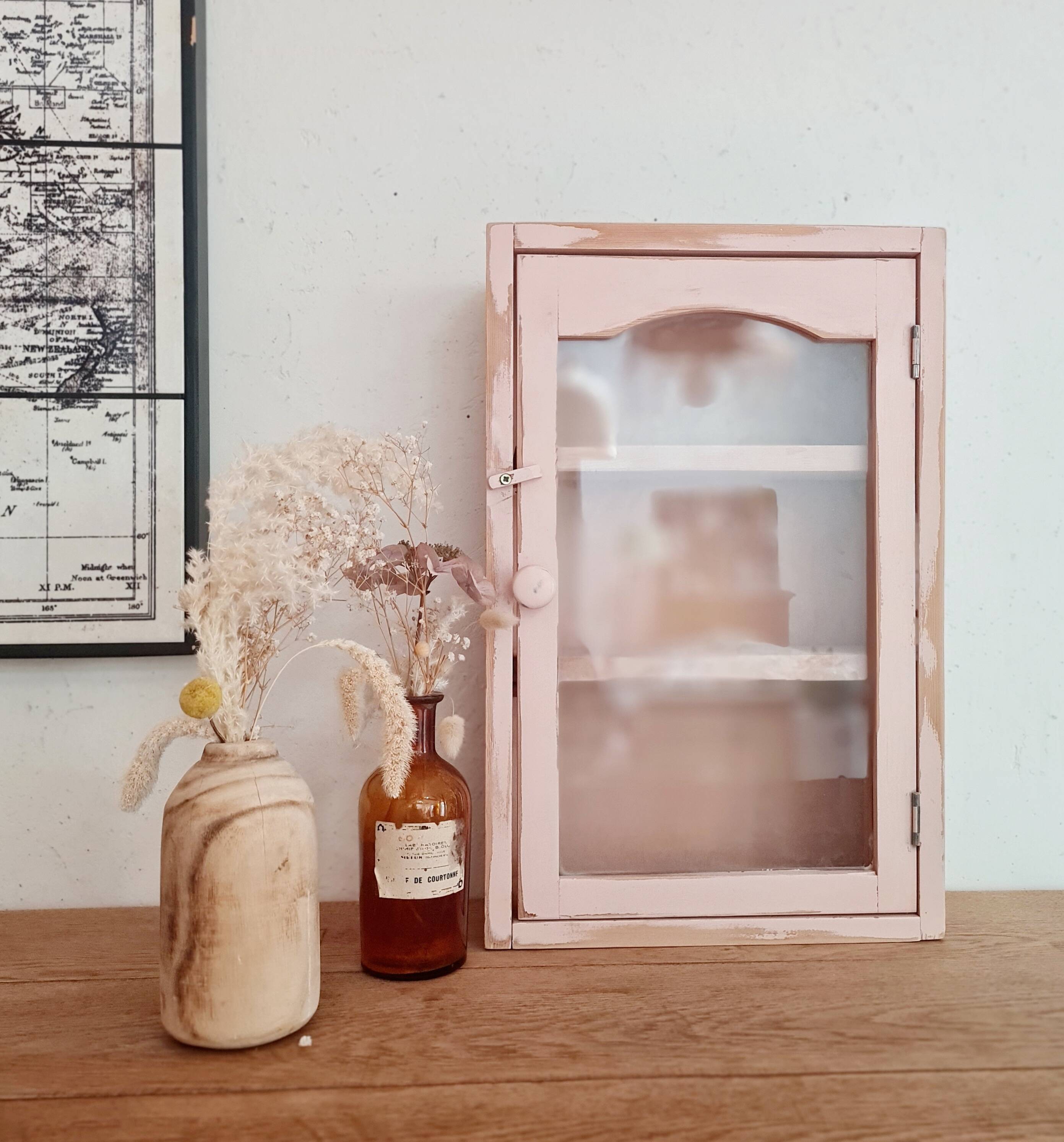Medicine cabinet in patinated pink wood