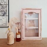 Medicine cabinet in patinated pink wood